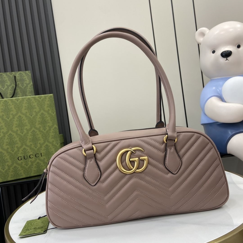 G*u*i top handle bags